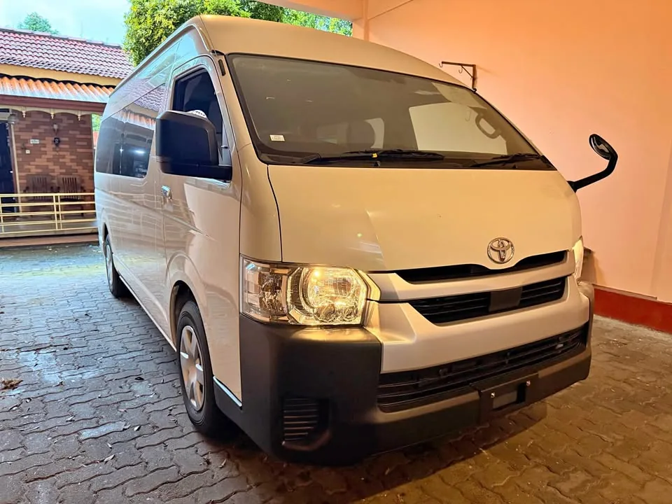 White passenger van for Sri Lanka airport transfers